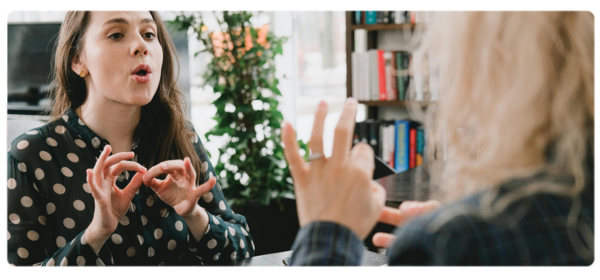 A language pathologist works with a client